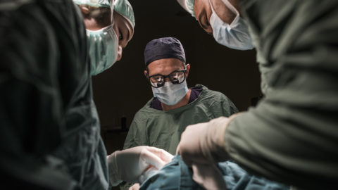 doctors conducting surgery