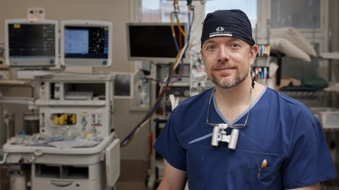 Volunteer surgeon in operating theatre