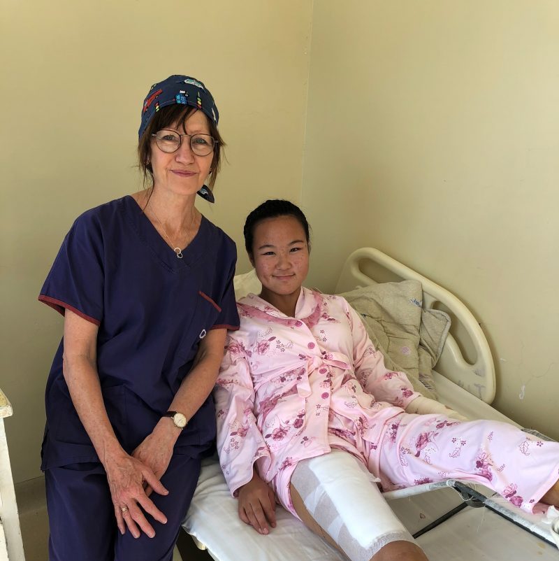 Patient with volunteer nurse